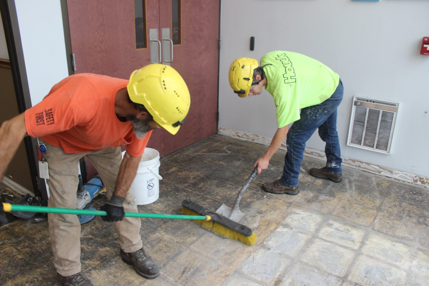 Houck team working on installing a new epoxy floor system in the Dairy Farmers of America facility.