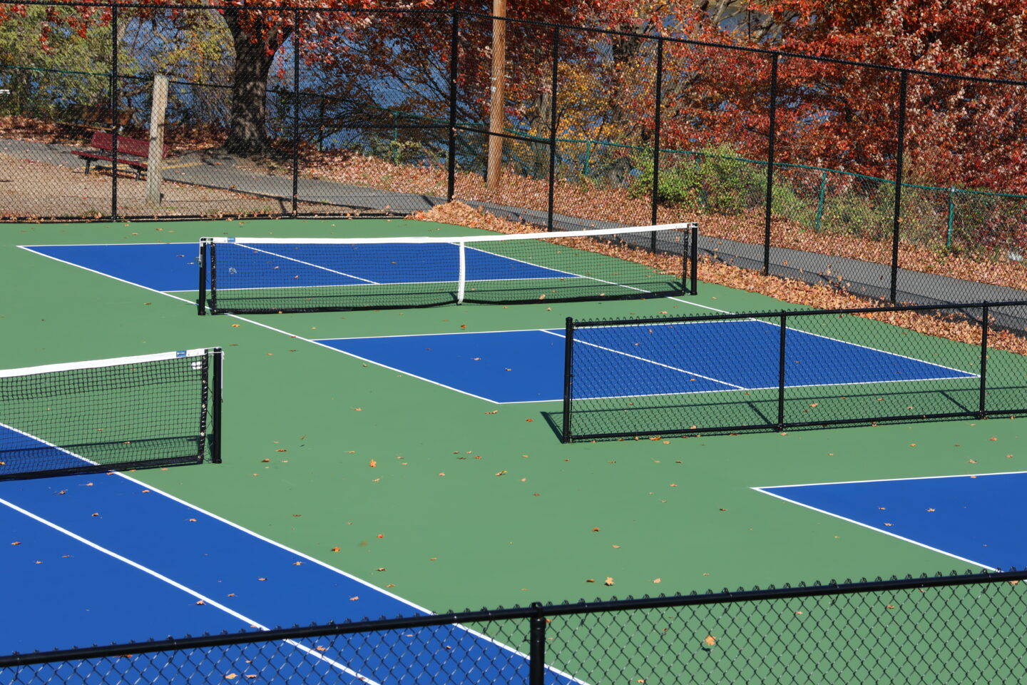 Side view of the newly restored tennis court.