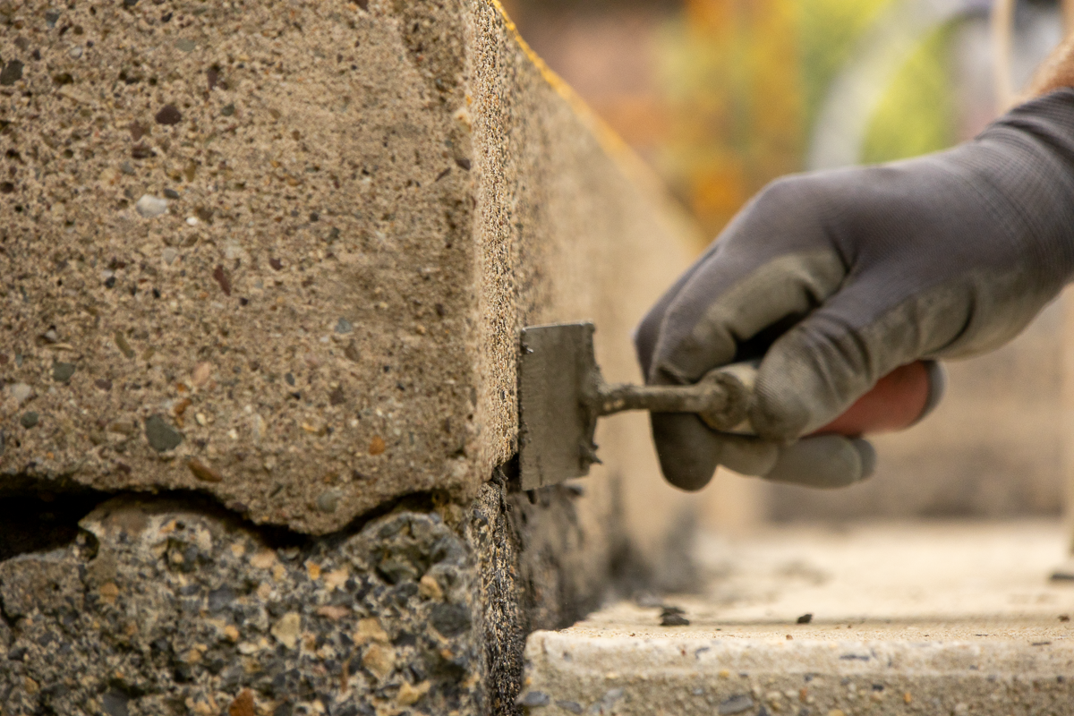 Close up of concrete step crack repair.