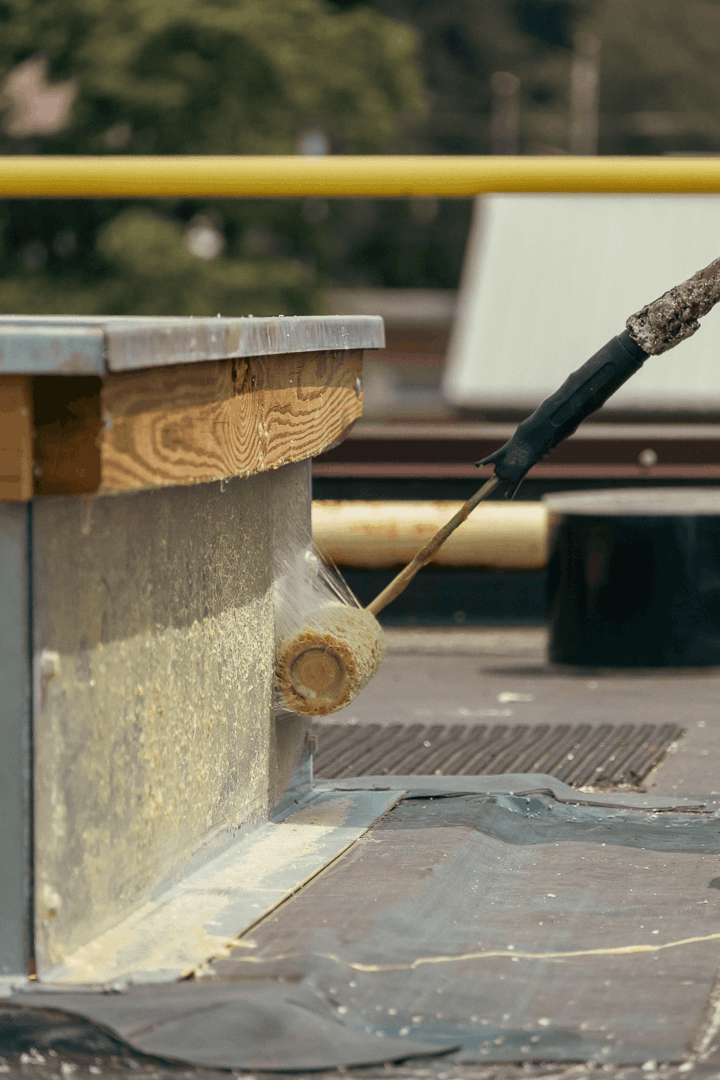 Close up of Houck team repairing roof.
