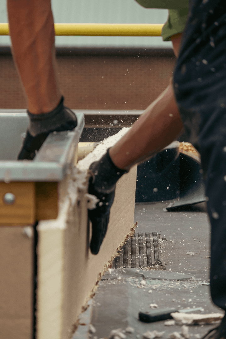 Close up of Houck team repairing roof.