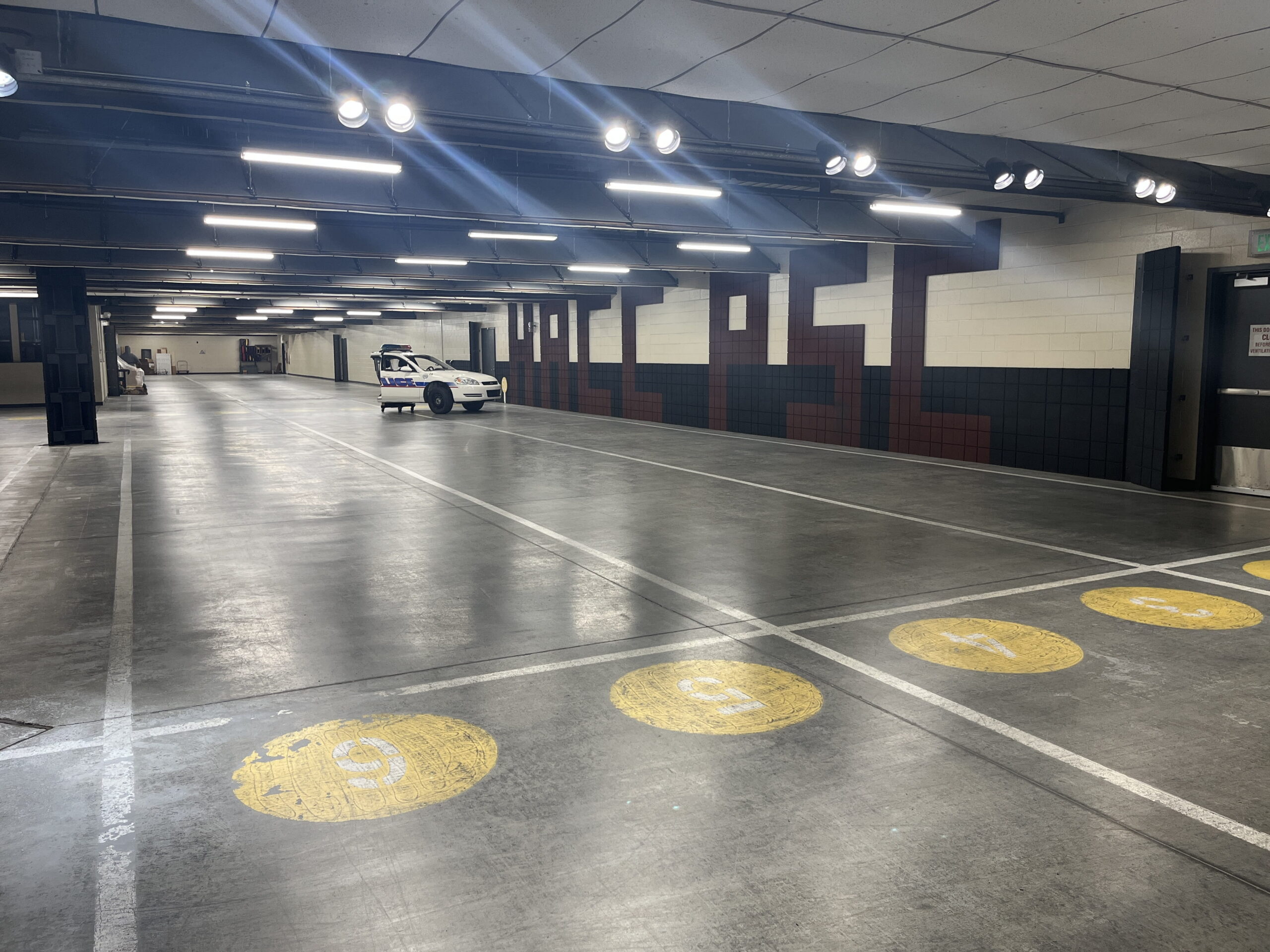 Concrete floor in local police facility before restoration.